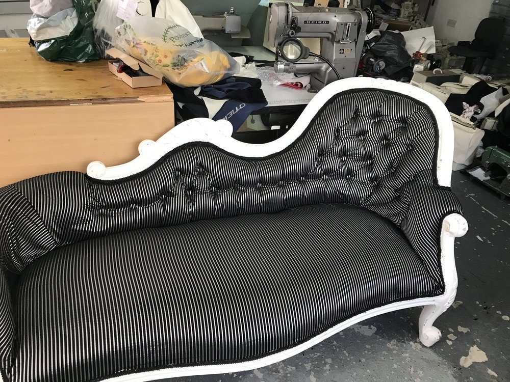 Chaise longue reupholstered in striped fabric